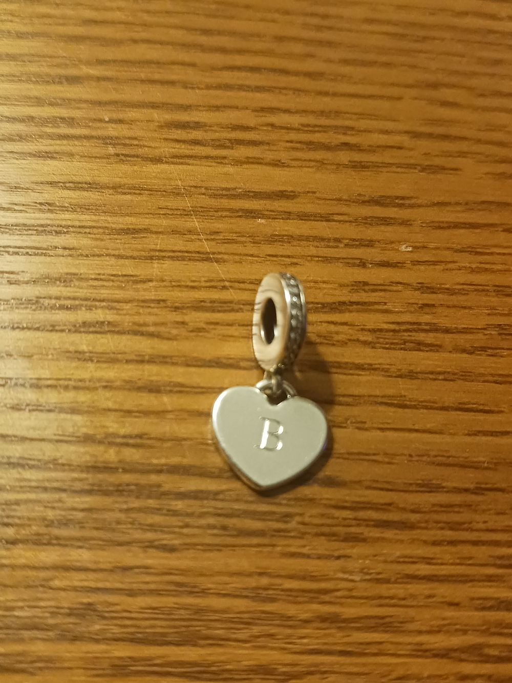 Pandora Silver Heart 'B' Charm Pendant on one Side and Paw Print on the other.